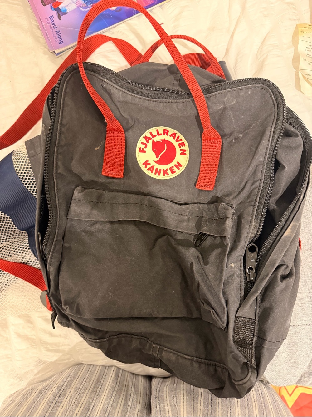 Black (or the darkest of blue) Backpack with Red Accents